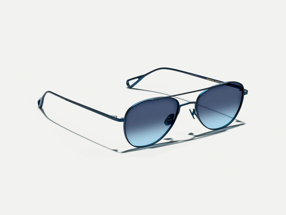 The SHMECKEL SUN in Navy with Denim Blue Tinted Lenses
