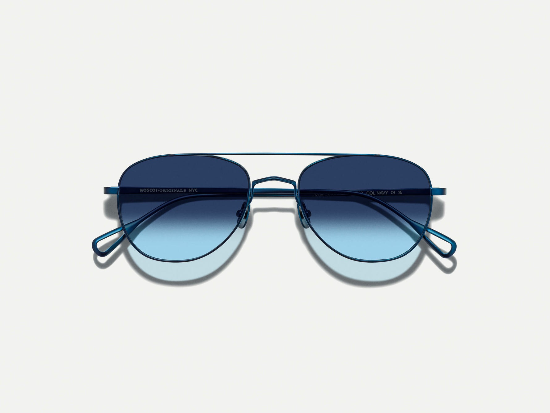 The SHMECKEL SUN in Navy with Denim Blue Tinted Lenses