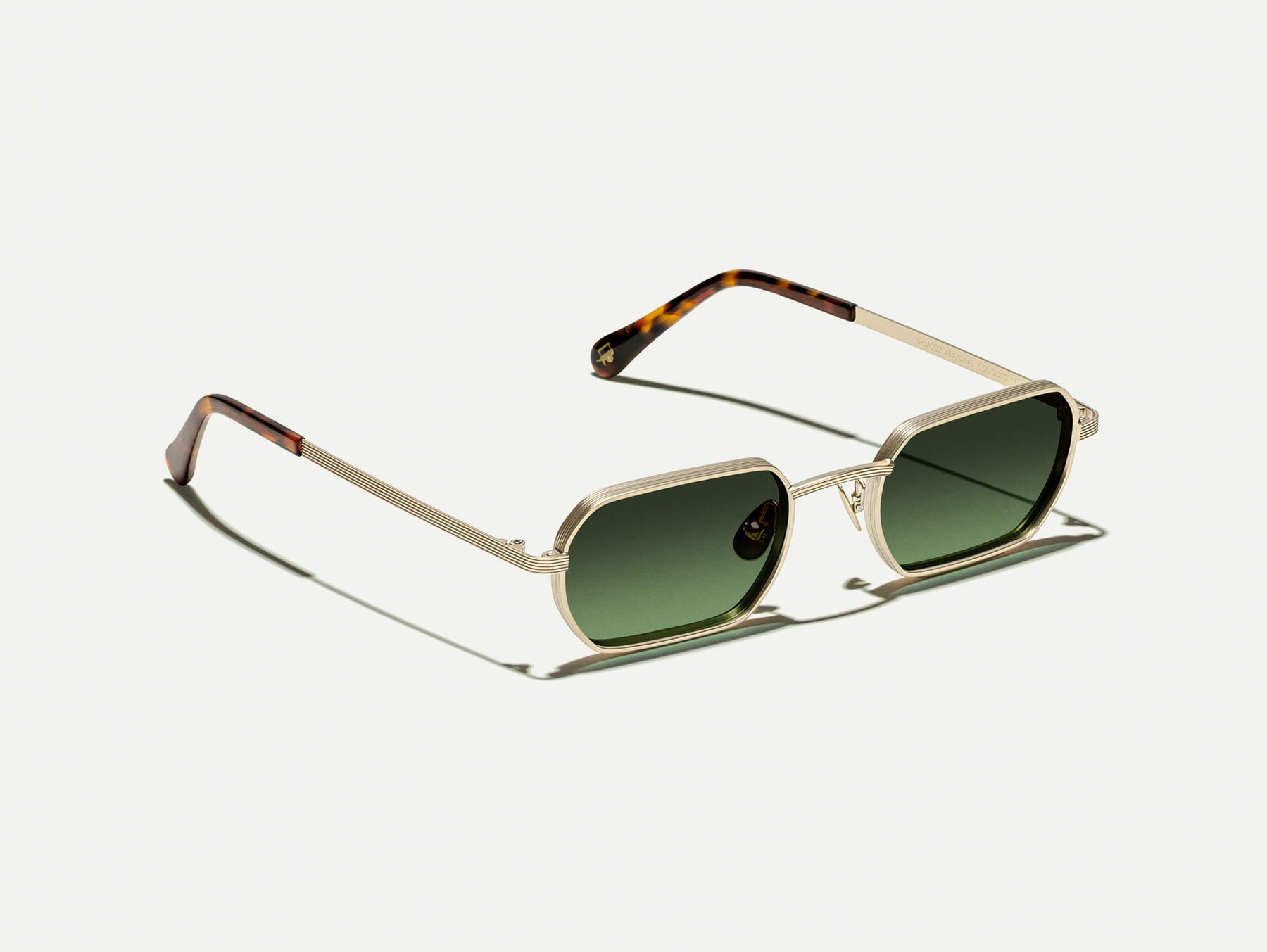 The SHMOOZ SUN in Gold with Forest Wood Tinted Lenses