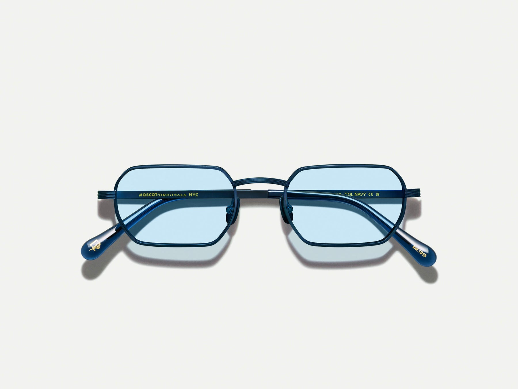 The SHMOOZ SUN in Navy with Bel Air Blue Tinted Lenses