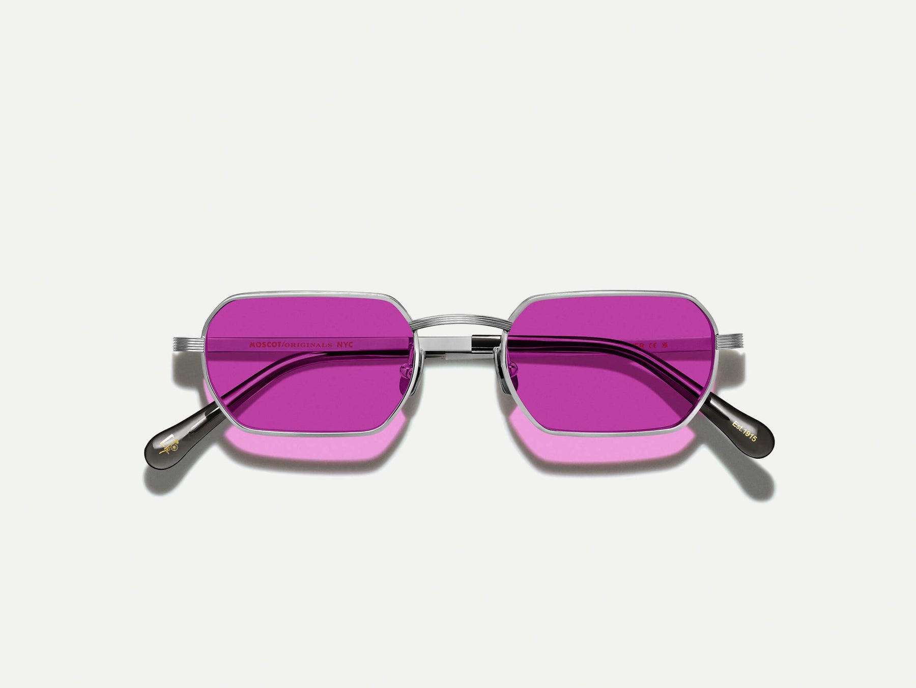 The SHMOOZ SUN in Silver with Purple Nurple Tinted Lenses