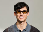 Model is wearing The SHTUP SUN in size 51 in Tortoise with Chestnut Fade Tinted Lenses
