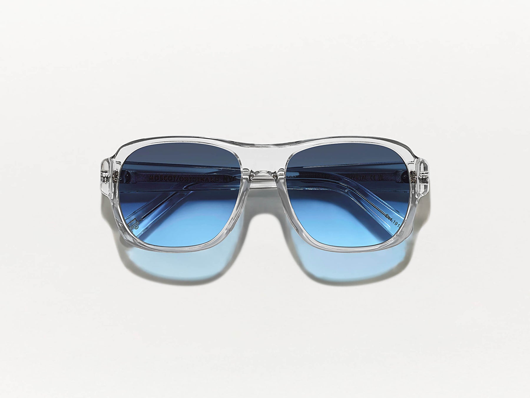 The SHVITZ SUN in Crystal with Denim Blue Tinted Lenses