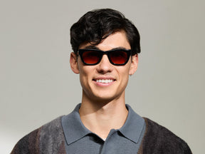Model is wearing The SPILKES SUN in size 48 in Black with Cabernet Tinted Lenses 