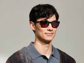 Model is wearing The SPILKES SUN in size 48 in Black with Cabernet Tinted Lenses 