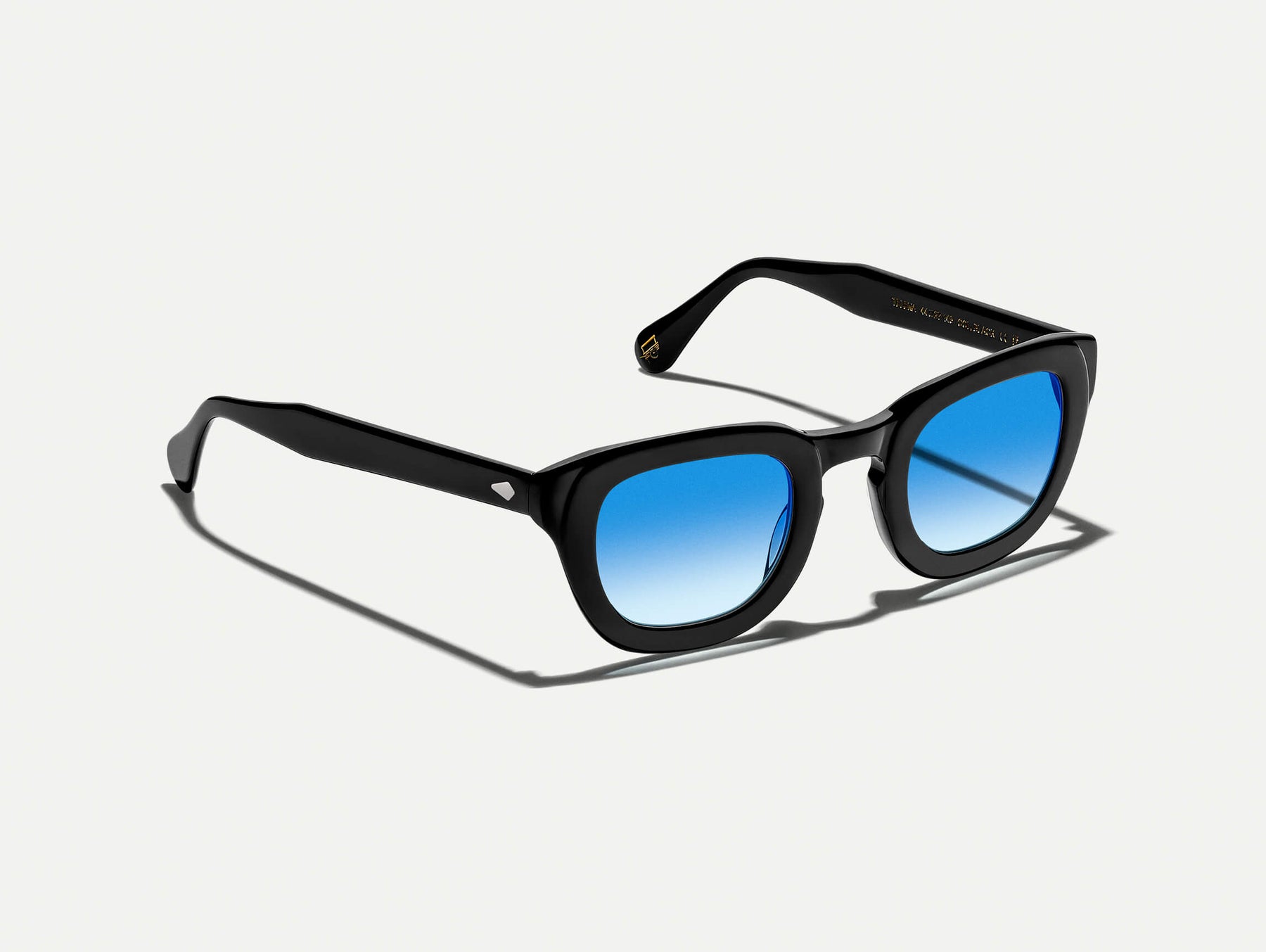 The TELENA in Black with Broadway Blue Fade Tinted Lenses