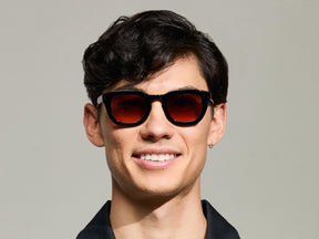 Model is wearing The TELENA in Black in size 47 with Cabernet Tinted Lenses