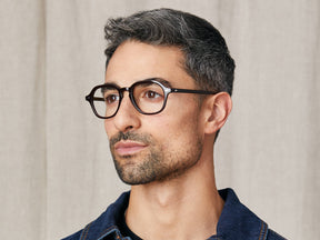 Model is wearing The YENEM in size 50 in Dark Brown