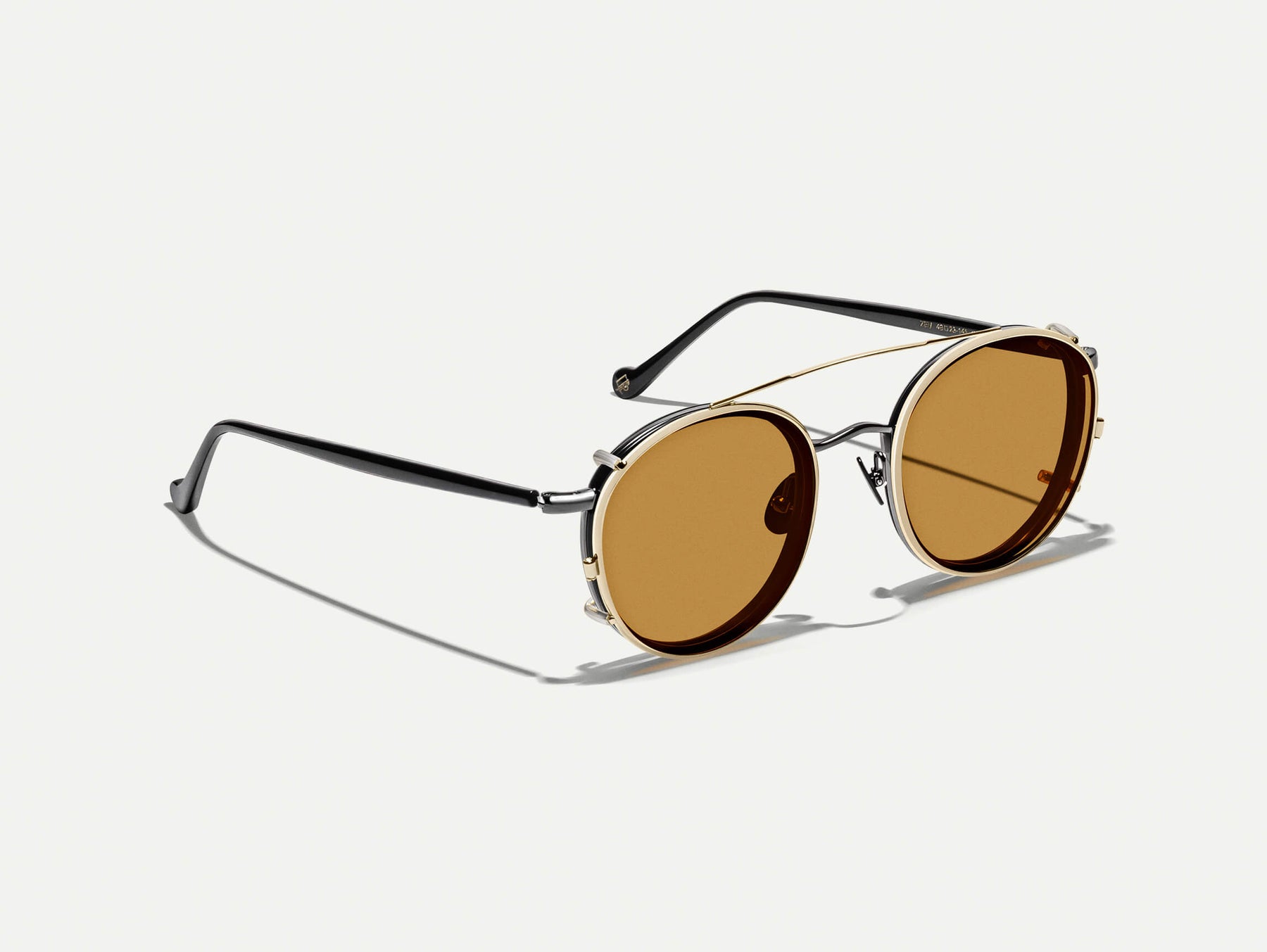 The ZEV CLIP  in Gold with Amber Tinted Lenses
