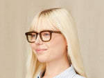 Model is wearing The ZISSEL in size 49 in Olive Brown