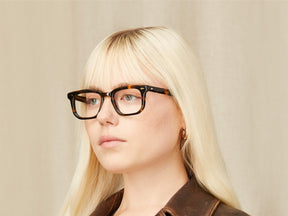 Model is wearing The ZISSEL in size 49 in Classic Havana