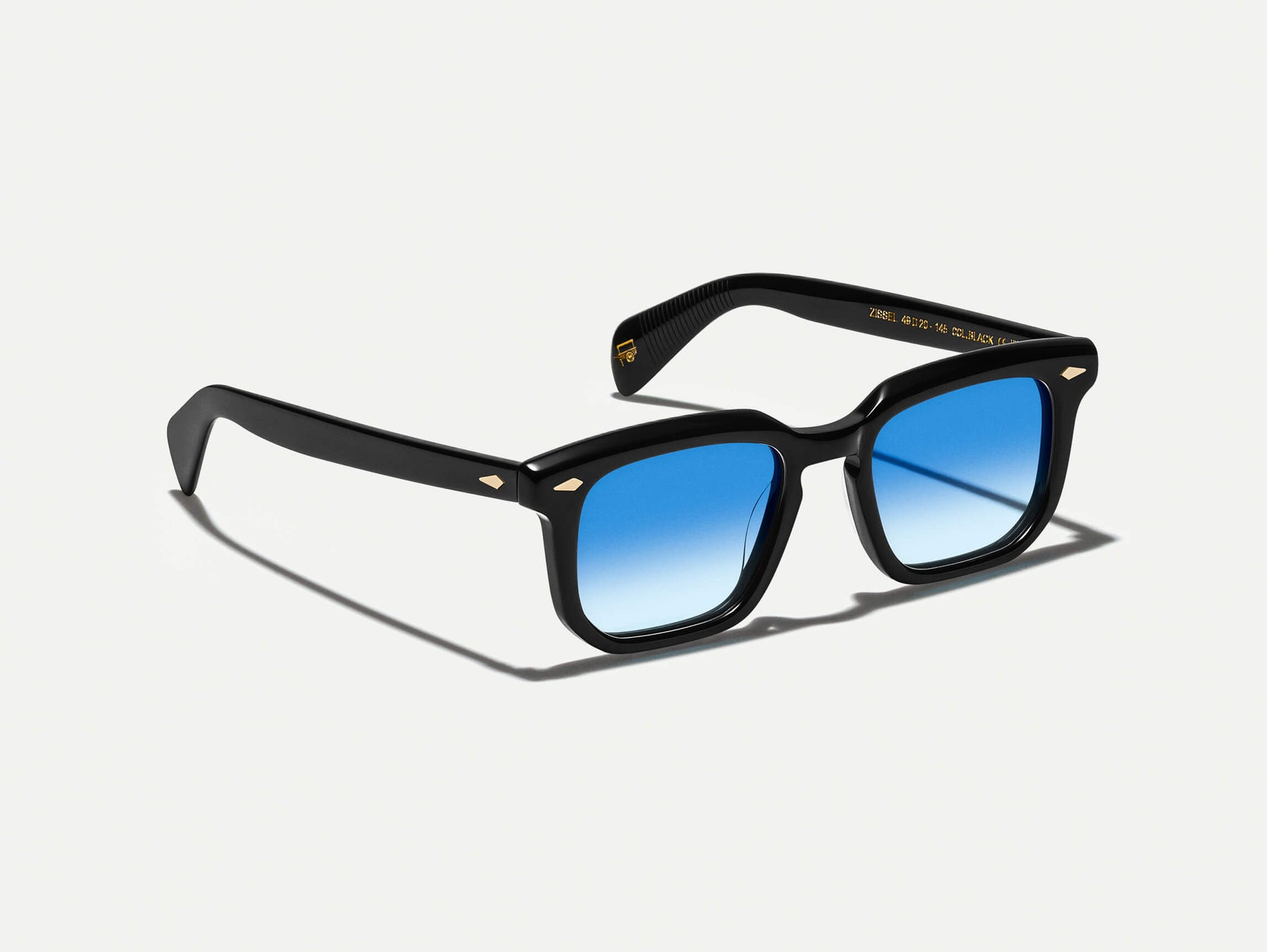 The ZISSEL SUN in Black with Broadway Blue Tinted Lenses