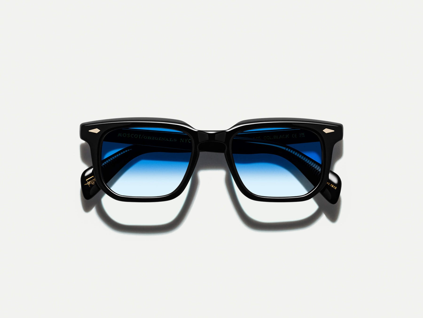 The ZISSEL SUN in Black with Broadway Blue Tinted Lenses