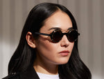 Model is wearing The ZOLMAN CLIP in Gold in size 42 with G-15 Lenses