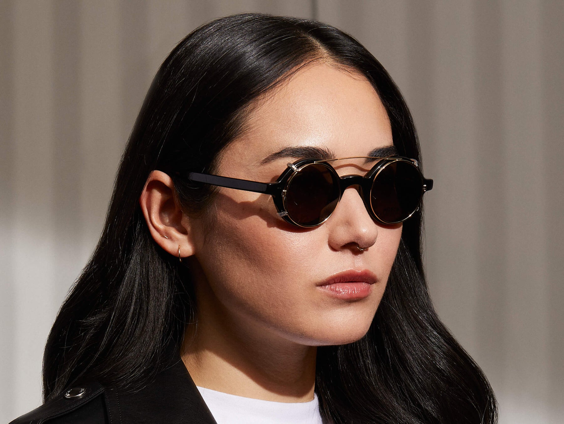 Model is wearing The ZOLMAN CLIP in Gold in size 42 with G-15 Lenses