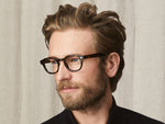 Model is wearing The LEMTOSH in size 46 in Tortoise
