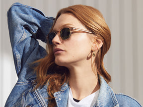 Model is wearing The BILLIK SUN in Cinnamon in size 47 with Calibar Green Glass Lenses