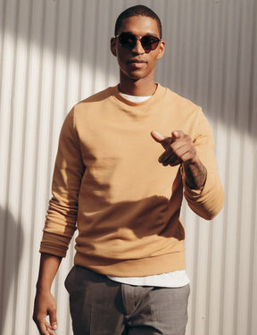 Model is wearing The BRUDE SUN in Burnt Tortoise/Gold in size 51 with Cosmitan Brown Glass Lenses