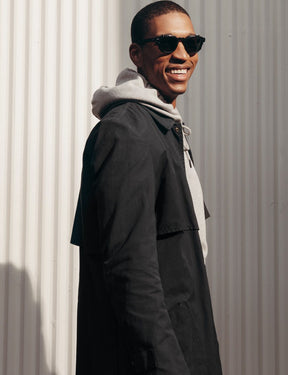 Model is wearing The CLIPTOSH POLARIZED in Matte Black in size 46 with G-15 lenses