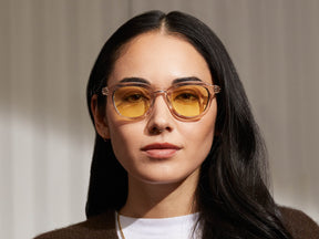 Model is wearing The DAVHEN in Mist in size 47 with Pastel Yellow Tinted Lenses