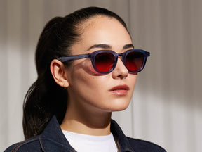 Model is wearing The DAHVEN in Sapphire in size 47 with Cabernet Tinted Lenses