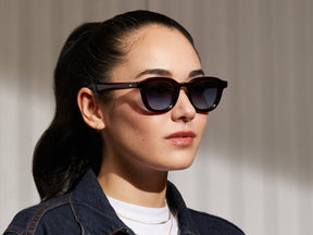 Model is wearing The DAHVEN in Burgundy in size 47 with Denim Blue Tinted Lenses