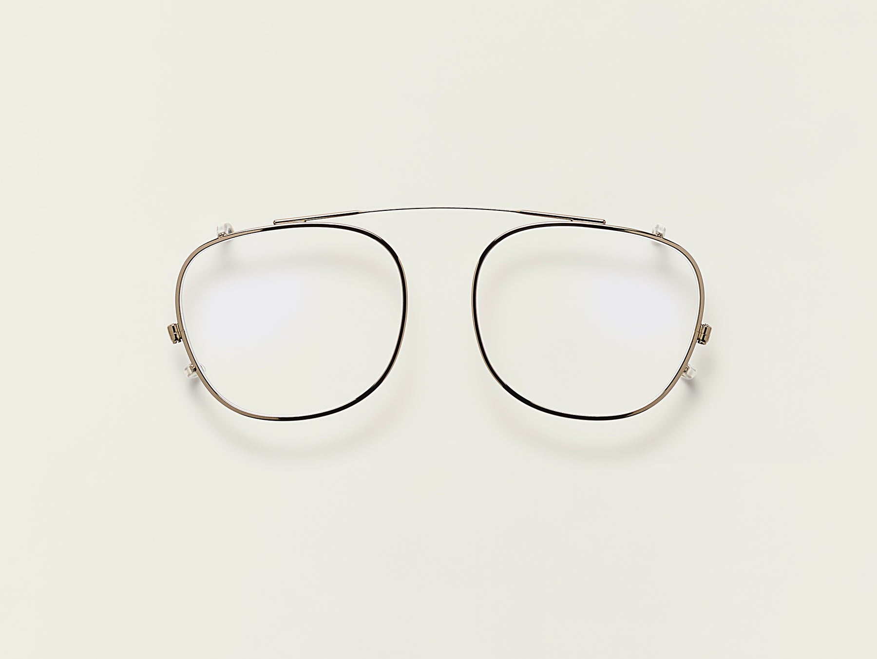 The ARTHUR CLIP in Brass with Blue Protect Lenses