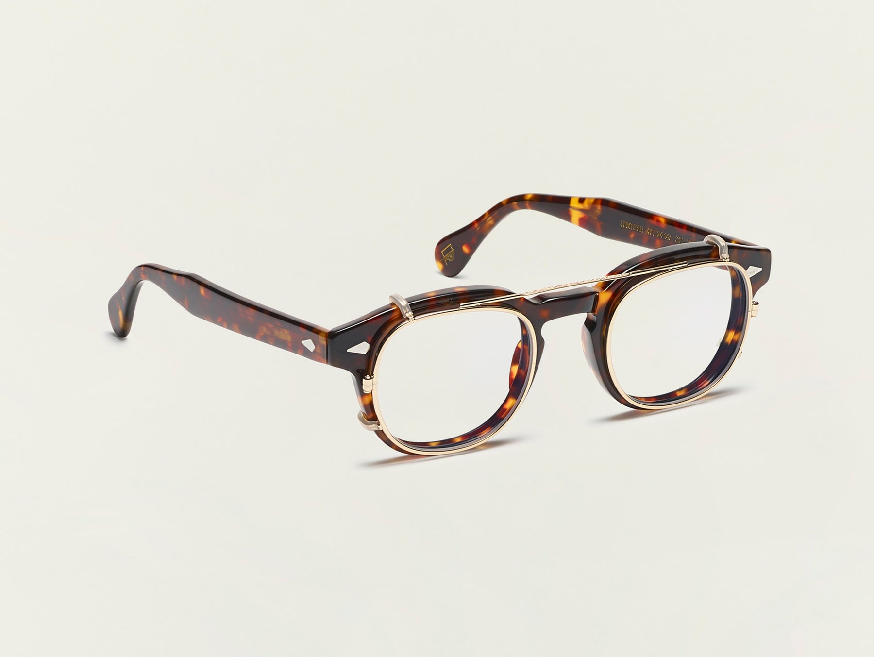 The CLIPTOSH in Gold with Blue Protect Lenses