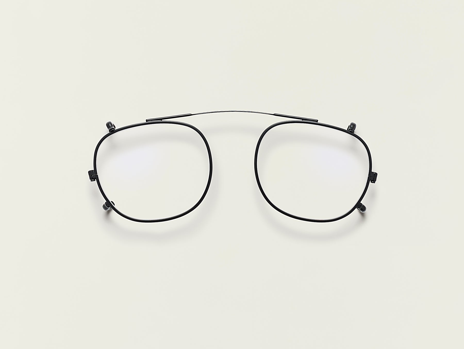 The CLIPTOSH in Matte Black with Blue Protect Lenses