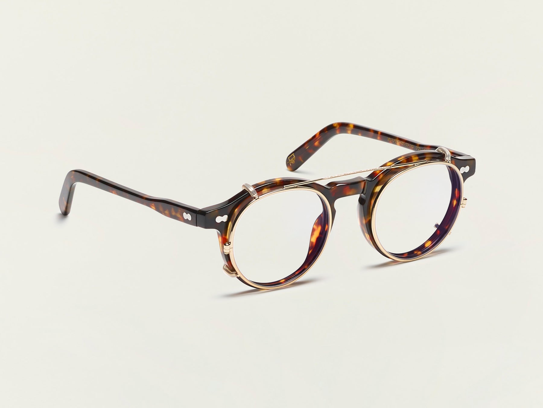 The CLIPZEN in Gold with Blue Protect Lenses