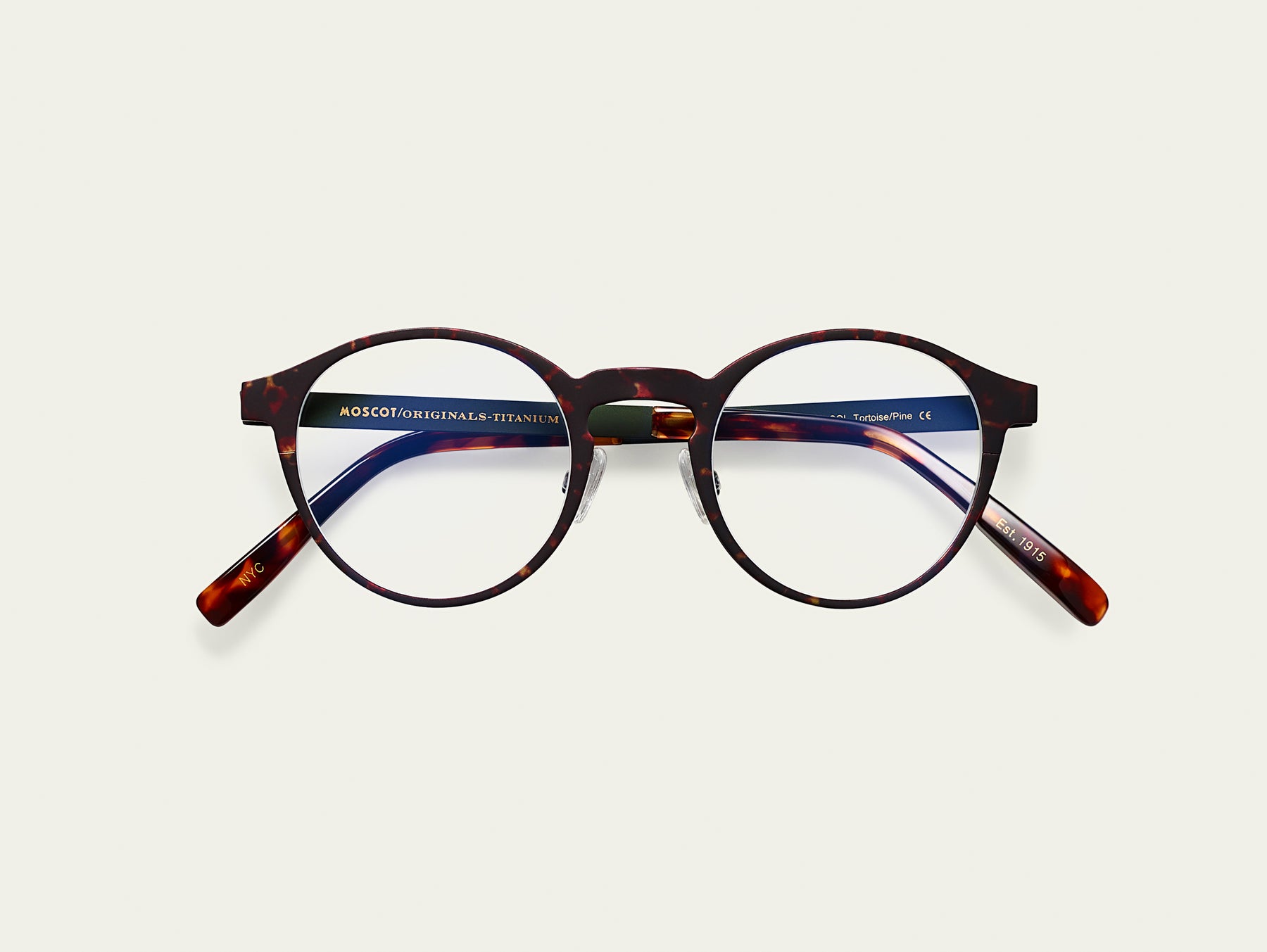 The MILTZEN-T in Tortoise/Pine with Blue Protect Lenses