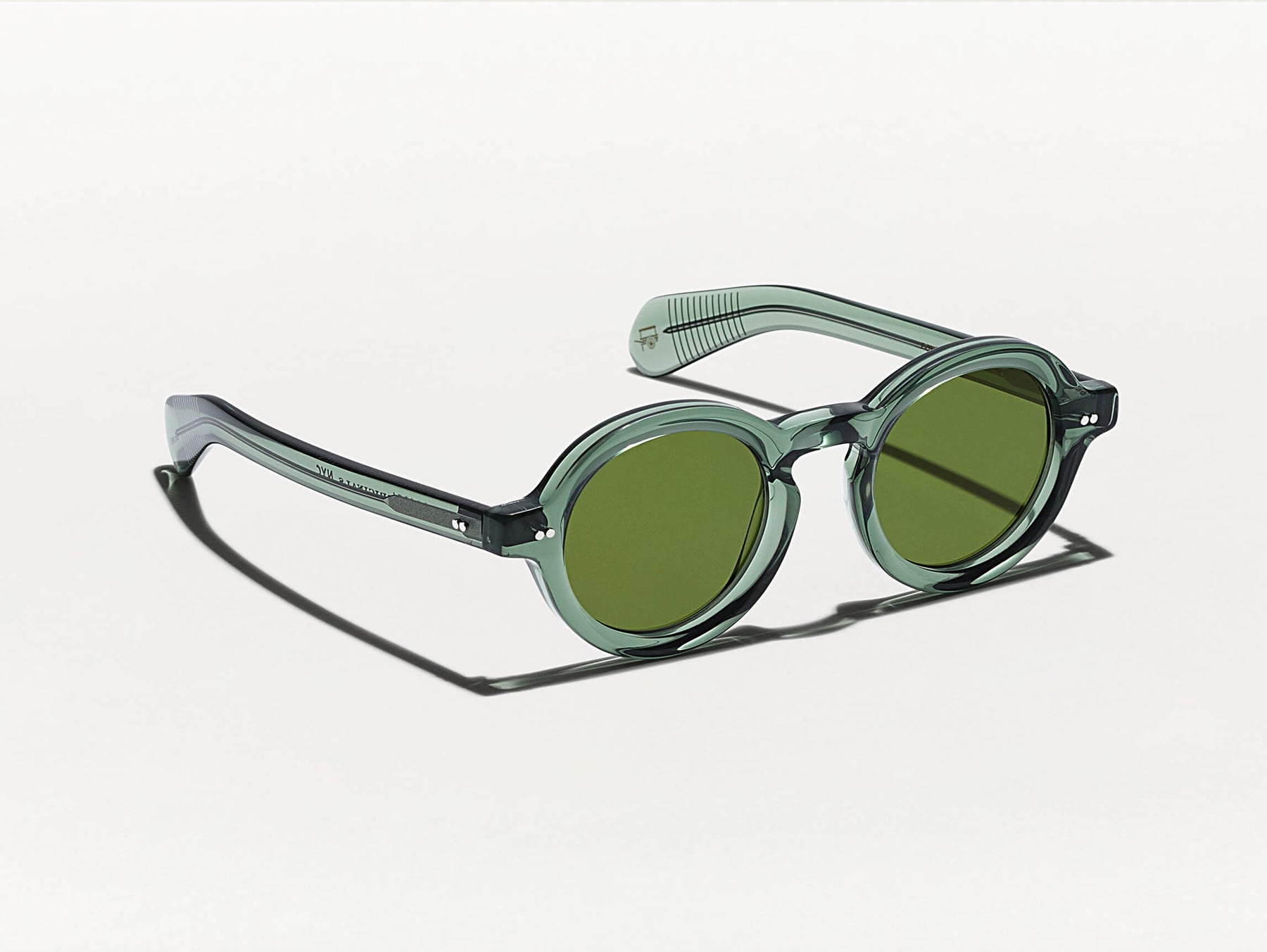 The FOYGEL SUN in Pine with Green Tinted Lenses