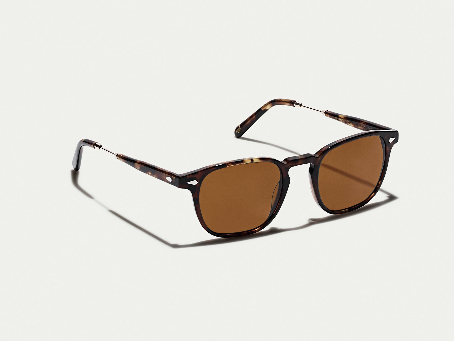 The GENUG SUN in Spot Tortoise/Gold with Cosmitan Brown Glass Lenses