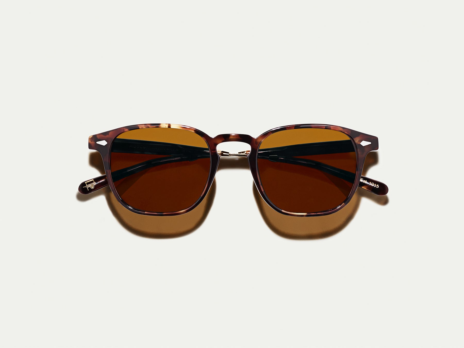 The GENUG SUN in Spot Tortoise/Gold with Cosmitan Brown Glass Lenses