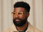 Model is wearing The GROBER in size 48 in Honey/Tortoise