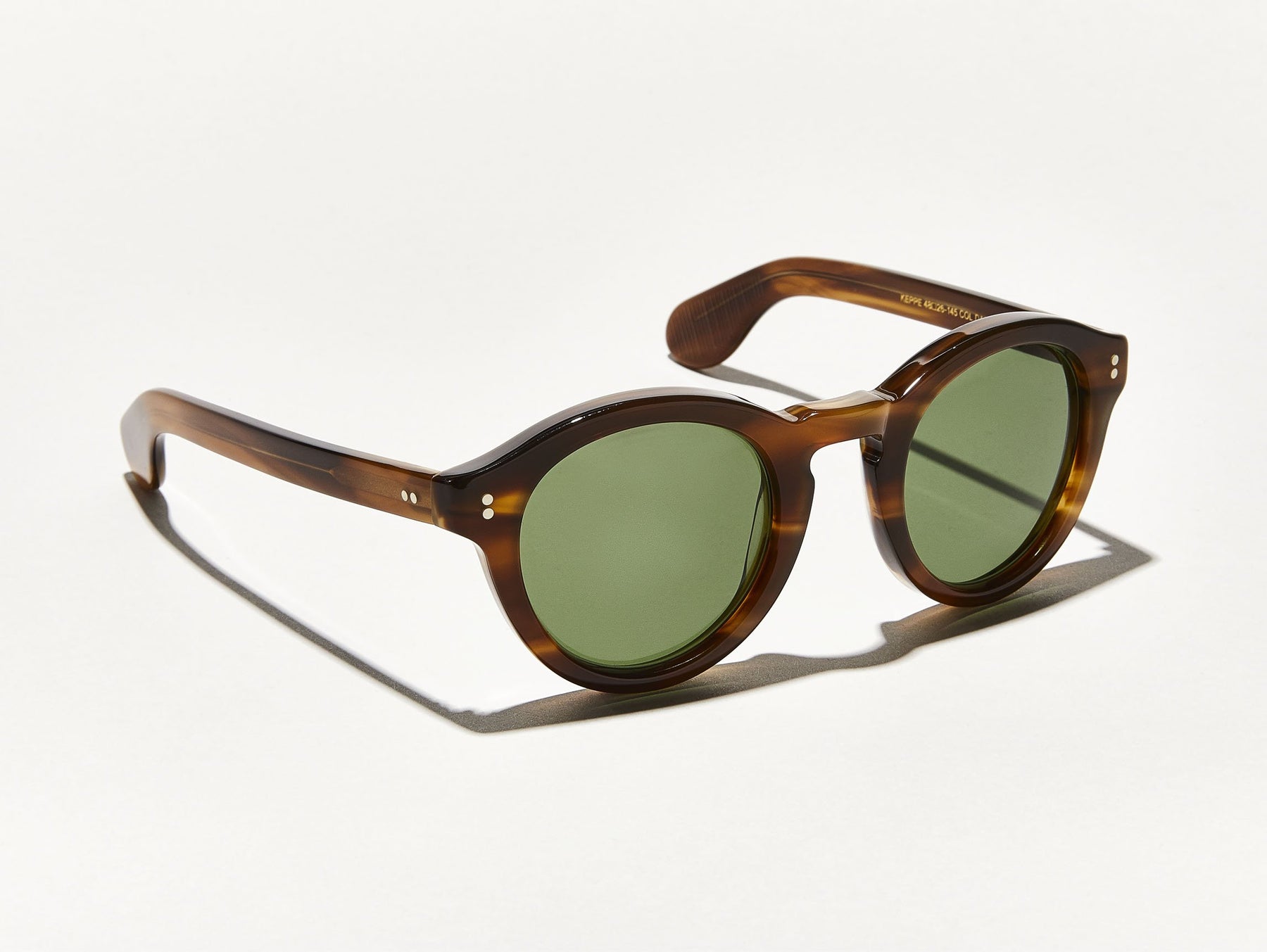 The KEPPE SUN in Dark Blonde with Calibar Green Glass Lenses