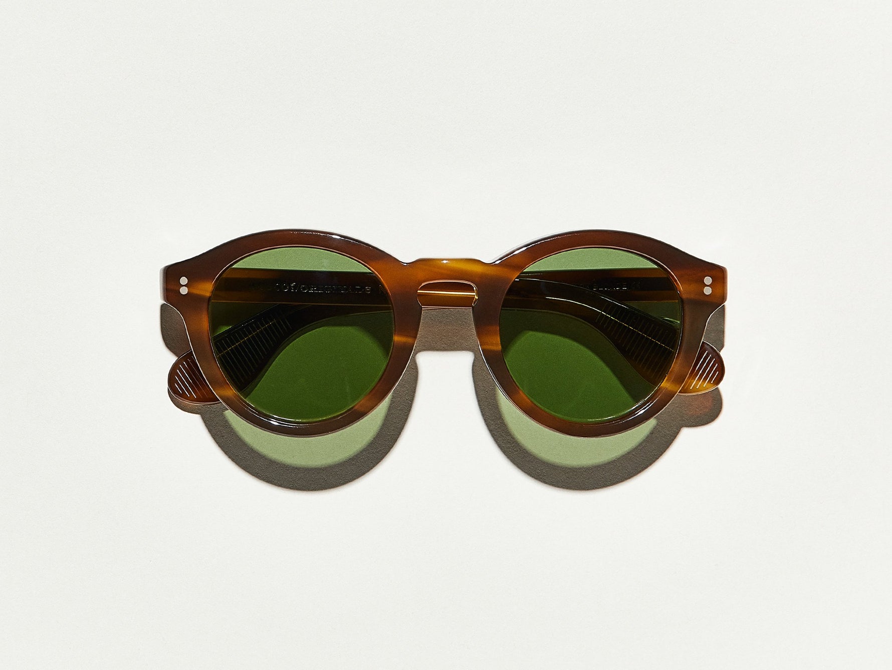 #color_dark blonde | The KEPPE SUN in Dark Blonde with Calibar Green Glass Lenses