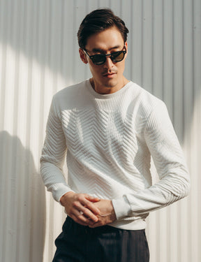 Model is wearing The LEMTOSH FOLD in Black in size 46 with G-15 Glass Lenses