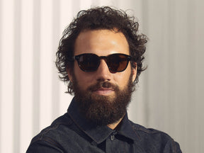 Model is wearing The LEMTOSH SUN-POLARIZED in size 46 in Tortoise with Cosmitan Brown Polarized Glass Lenses