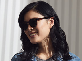 Model is wearing The LEMTOSH SUN with Metal Nose Pads in Tortoise in size 46 with G-15 Glass Lenses