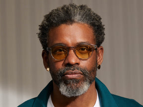 Model is wearing The LEMTOSH in Light Grey in size 49 with Pastel Yellow Tinted Lenses