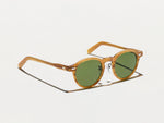 The MILTZEN SUN W/ METAL NOSE PADS in Blonde with Calibar Green Glass Lenses