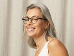 Model is wearing The MILTZEN-T READY READER in size 46 in Tortoise/Pine
