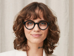 Model is wearing The GREPS in size 44 in Black