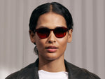 Model is wearing The LEMTOSH in Ruby in size 46 with Cabernet Tinted Lenses
