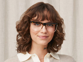 Model is wearing The SHONDA in size 58 in Honey/Tortoise