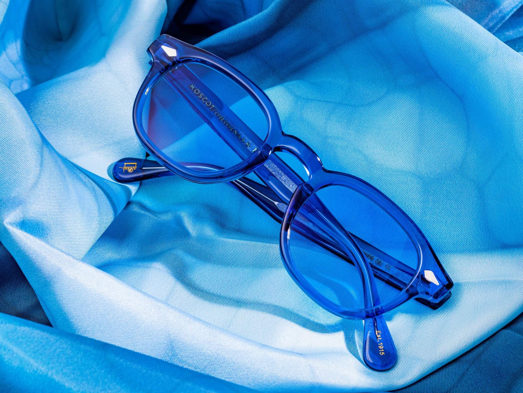 The LEMTOSH in Sapphire with Celebrity Blue Tinted Lenses