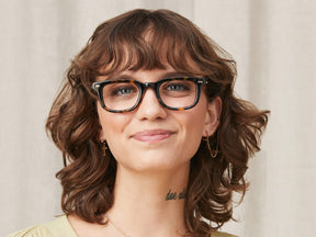 Model is wearing The KLUTZ in size 47 in Tortoise