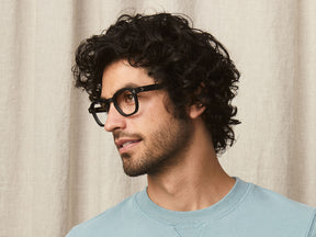 Model is wearing The MOMZA in size 49 in Matte Black