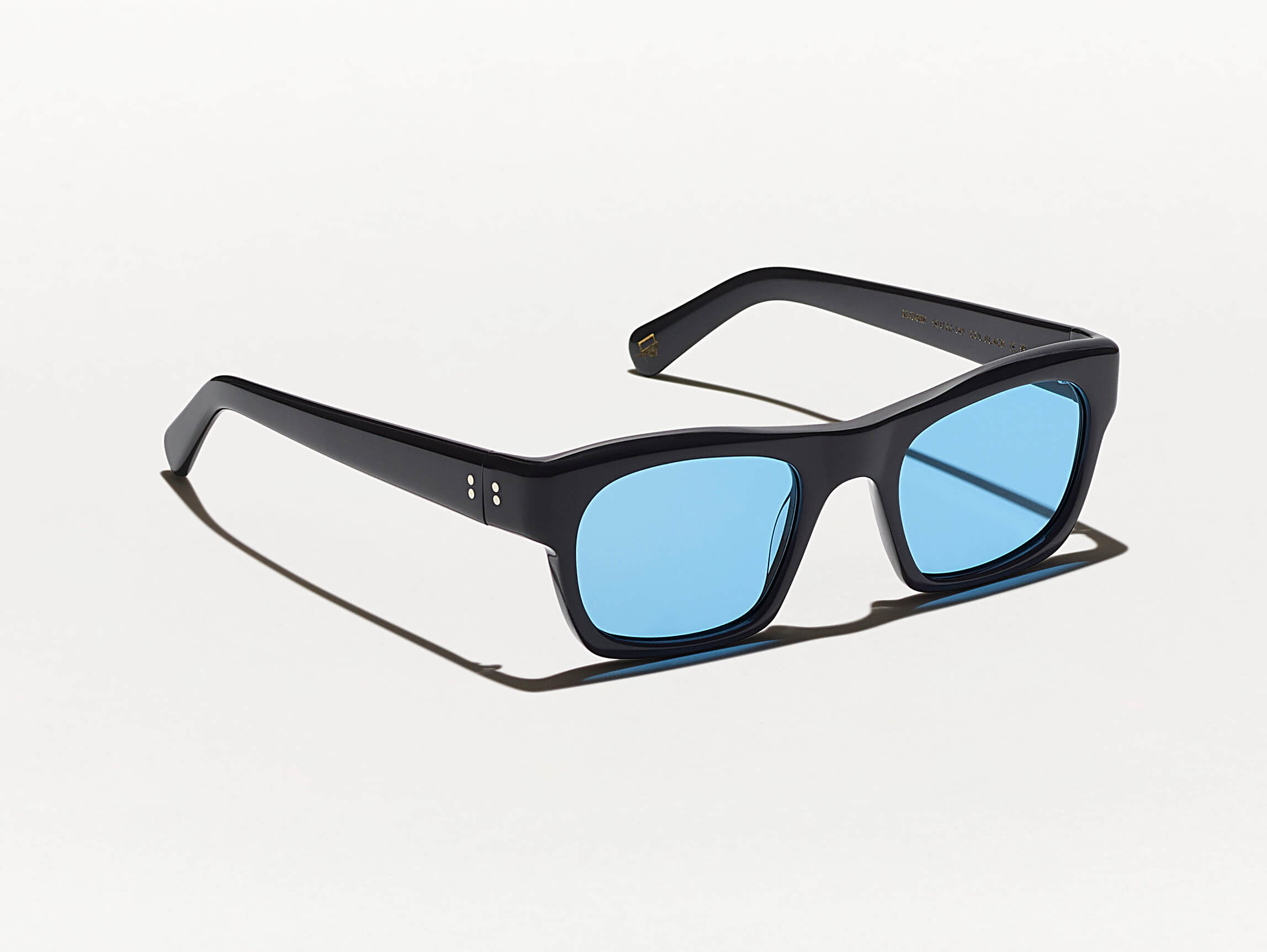 The NUDNIK SUN in Black with Celebrity Blue Tinted Lenses